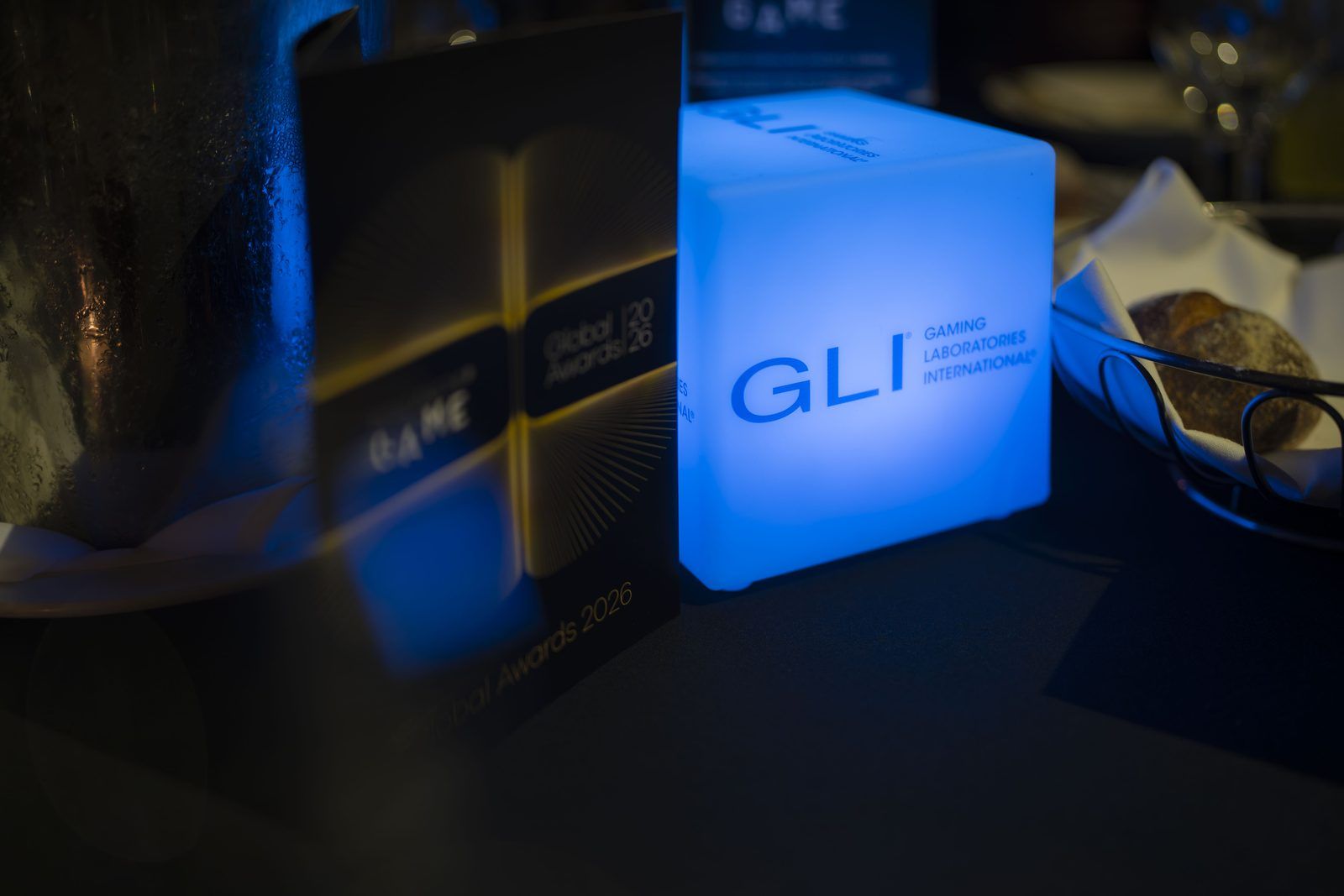 Custom made and printed glowing cubes used as a functional centrepiece during the conference